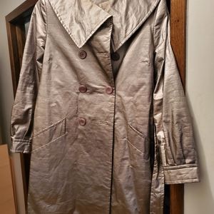 Shiny coppery look trench coat